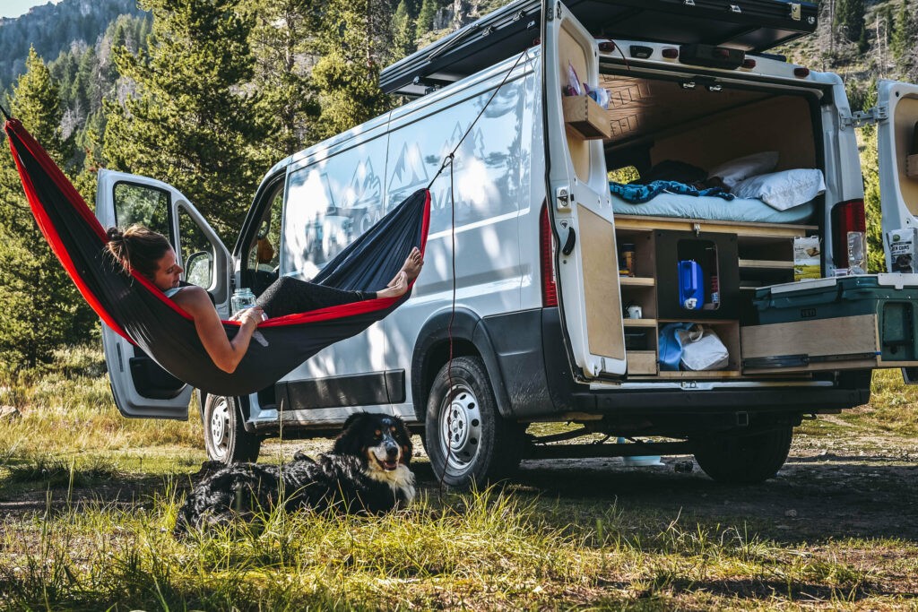 Chilling on a hammock with a campervan