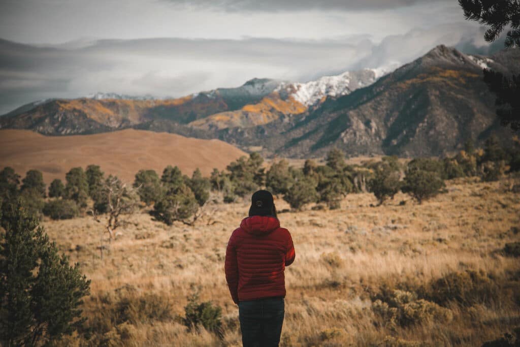 Person viewing the mountains of Colorado