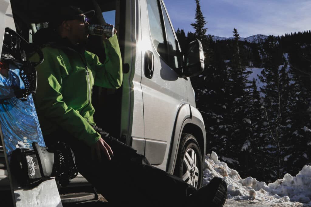 Enjoy a beer in a Campervan after snowboarding