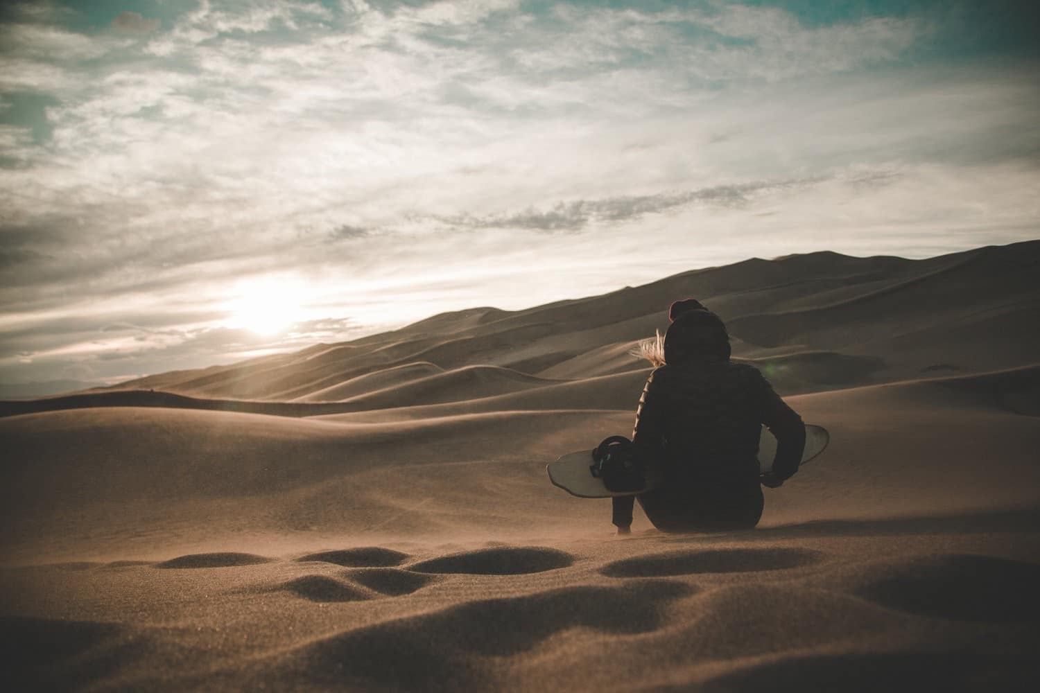 Sandboarding at the Great Sand Dunes National Park in Colorado.