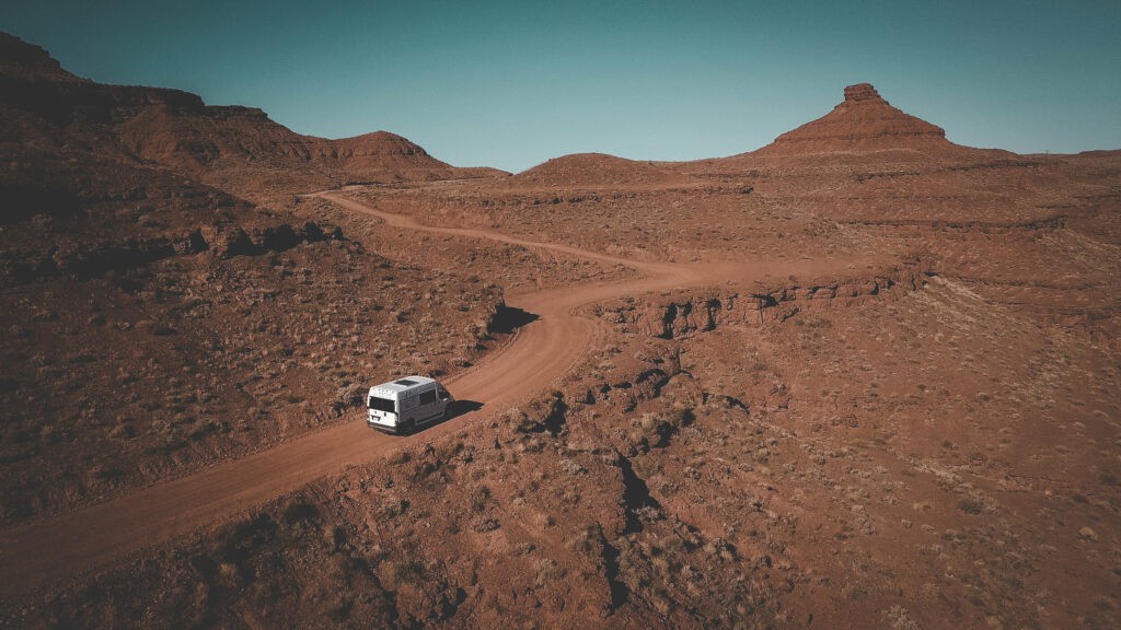 Driving a campervan in the wide open desert