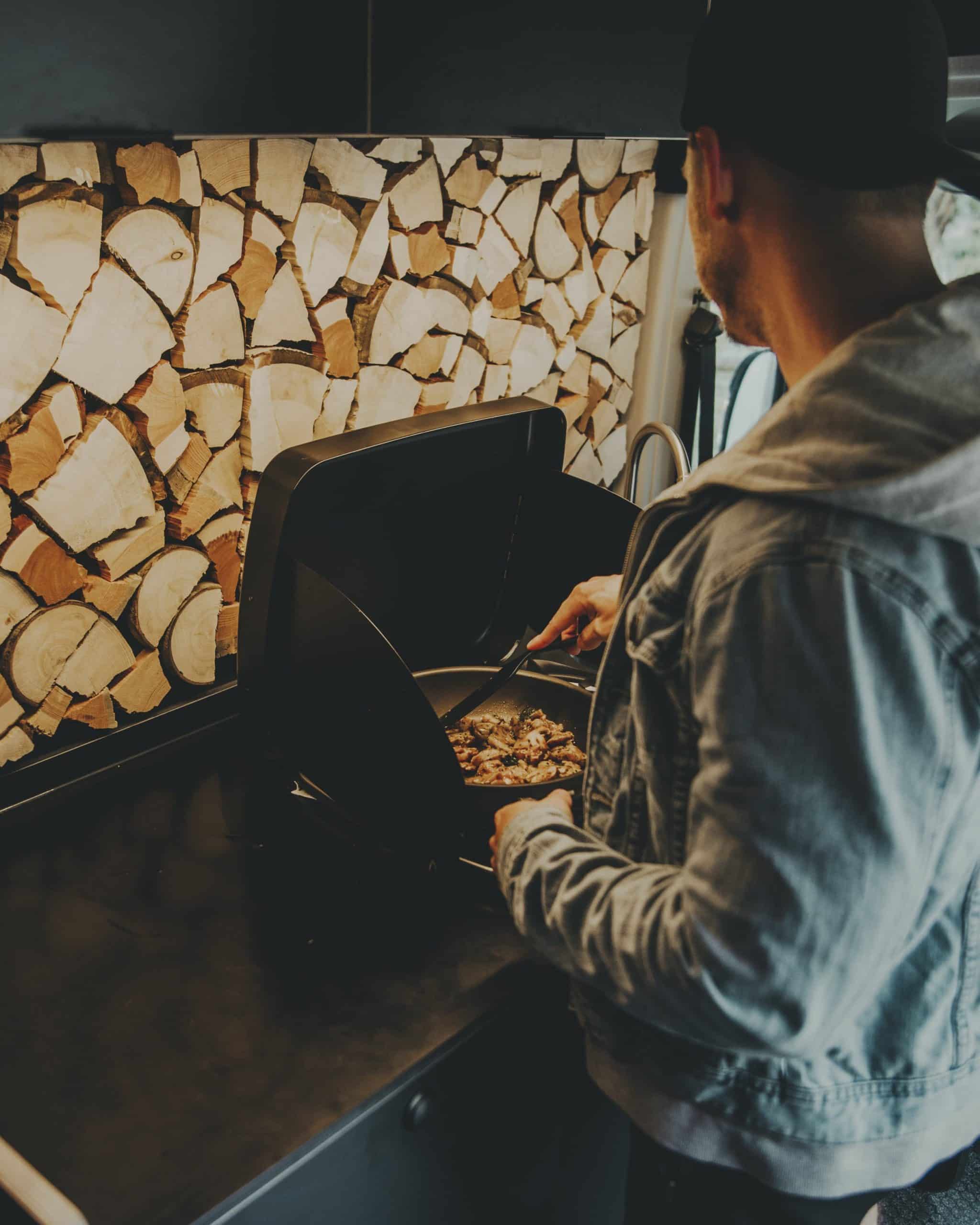 Cooking dinner in a Biggie Campervan