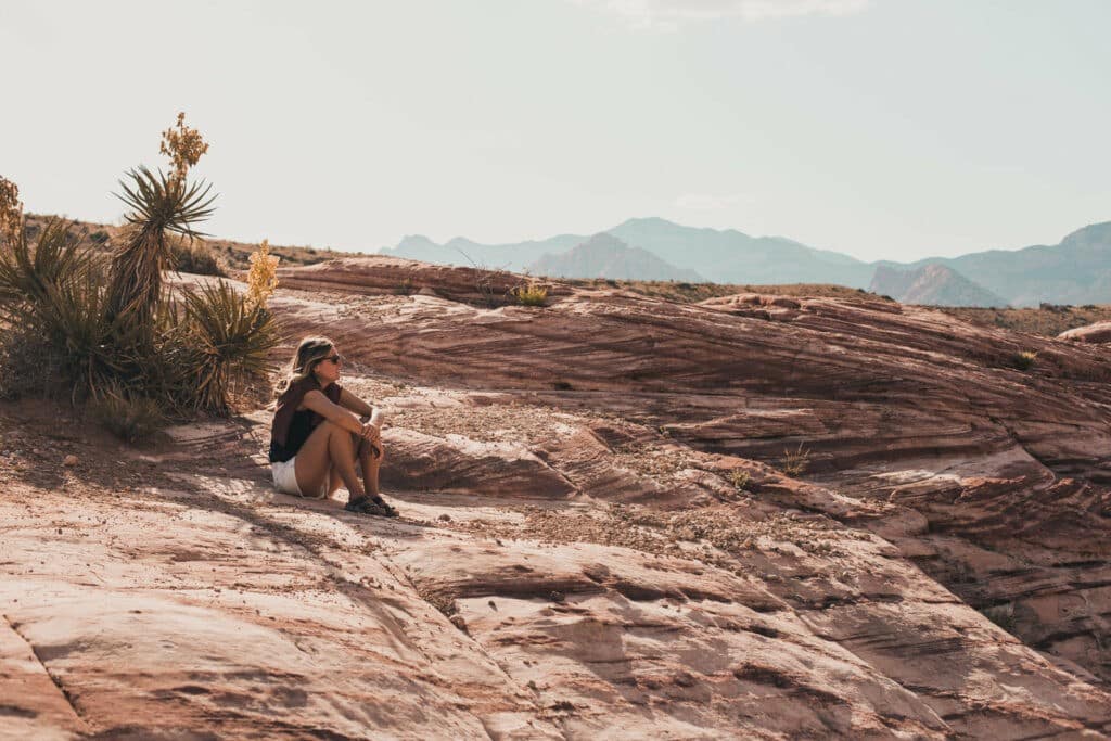 A woman taking in the view in the desert