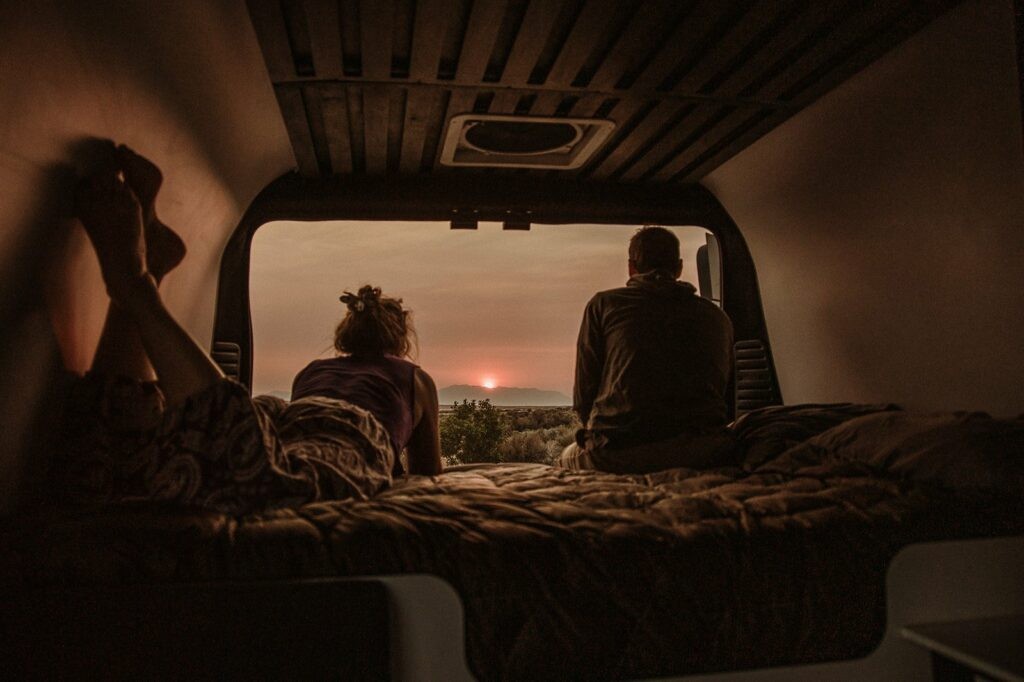 Looking a the sunset inside of a Campervan