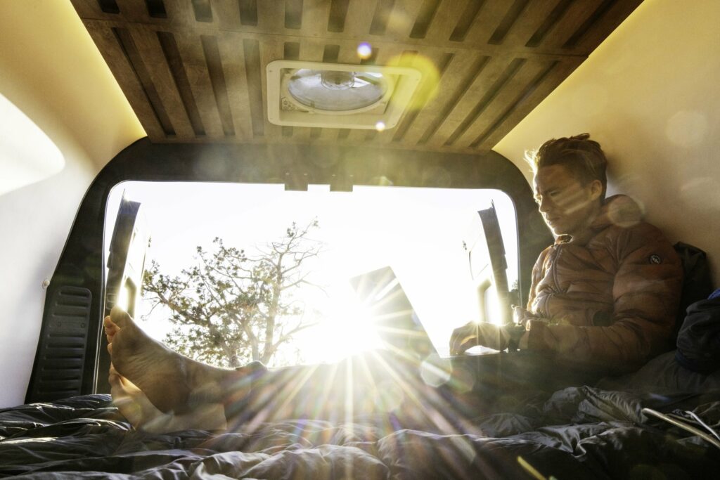 Doing work while lying down in a Campervan