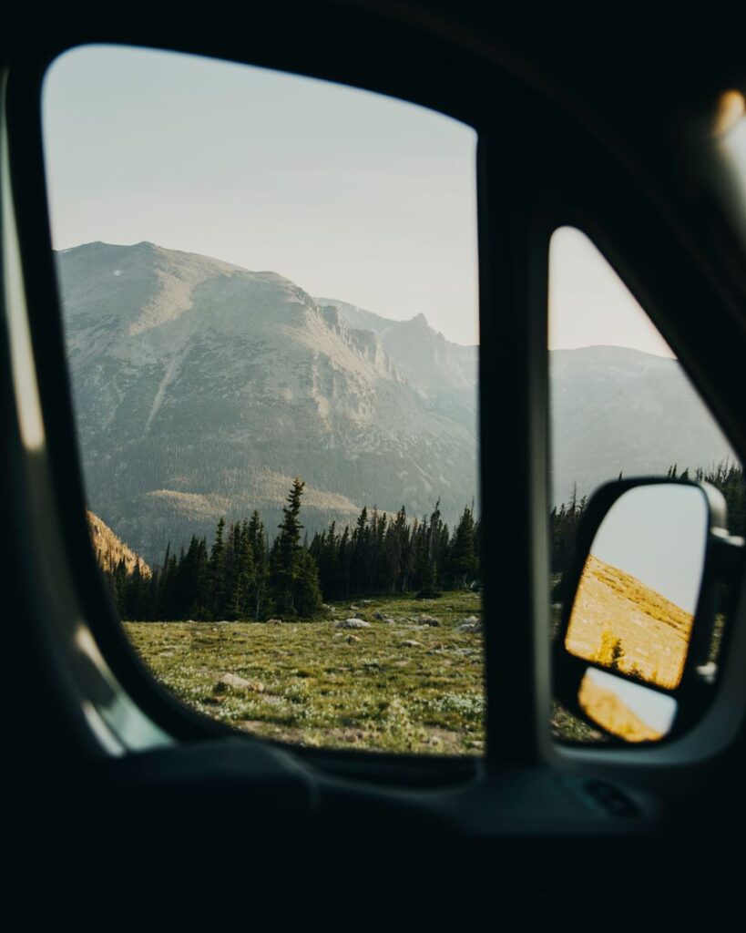 View of mountains from inside a campervan
