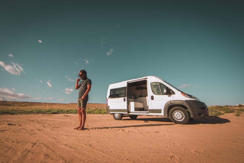 Man outside a Campervan in Taos, New Mexico