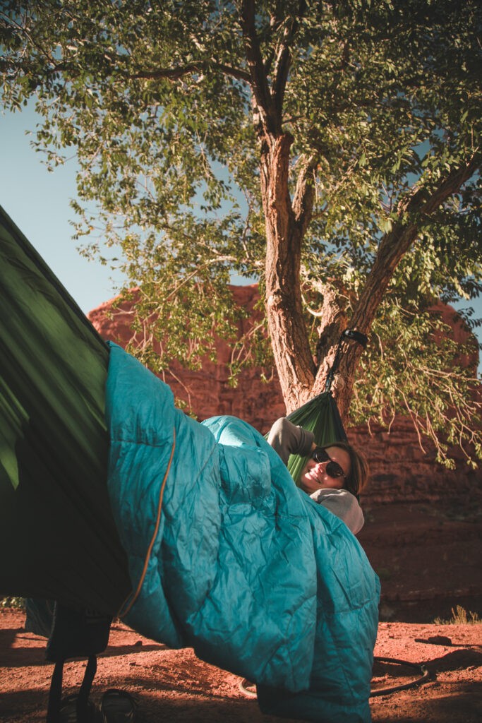 Woman in a hammock with a Rumpl blanket