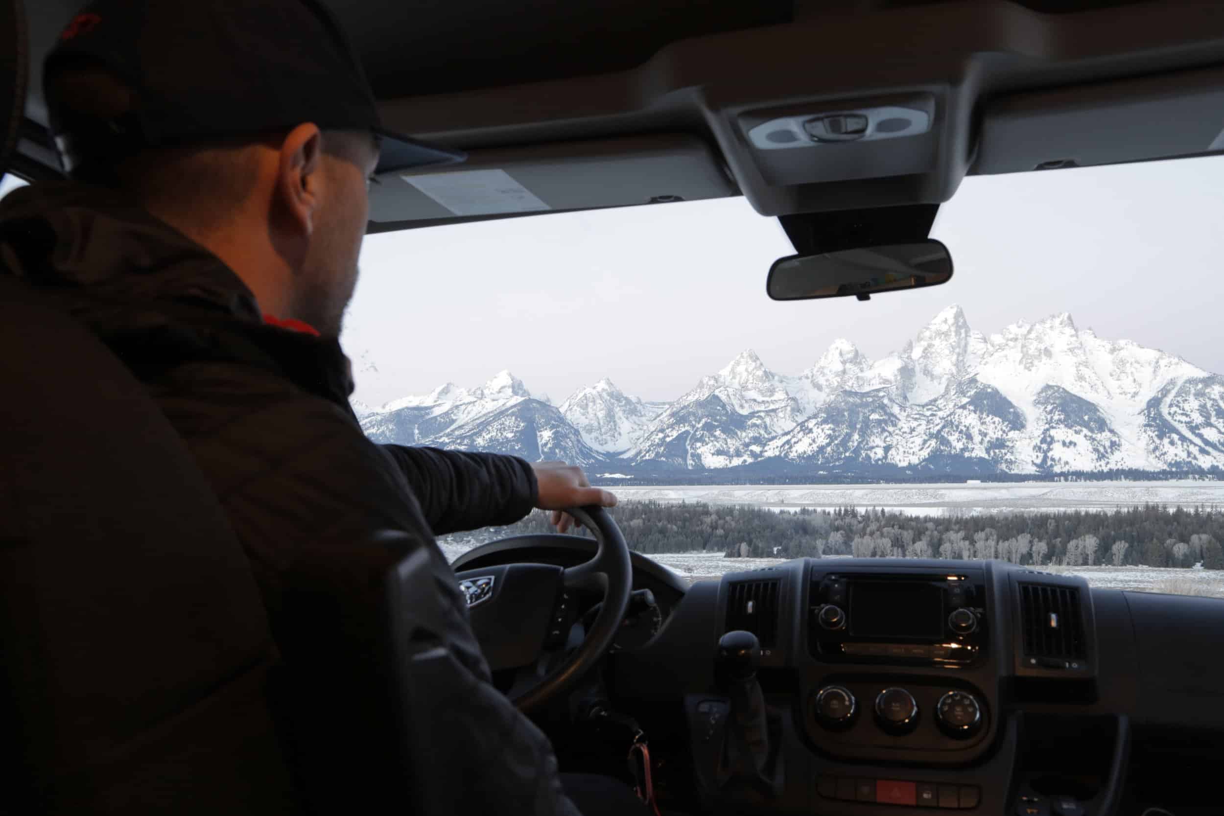 View of snow covered mountains from a Campervan