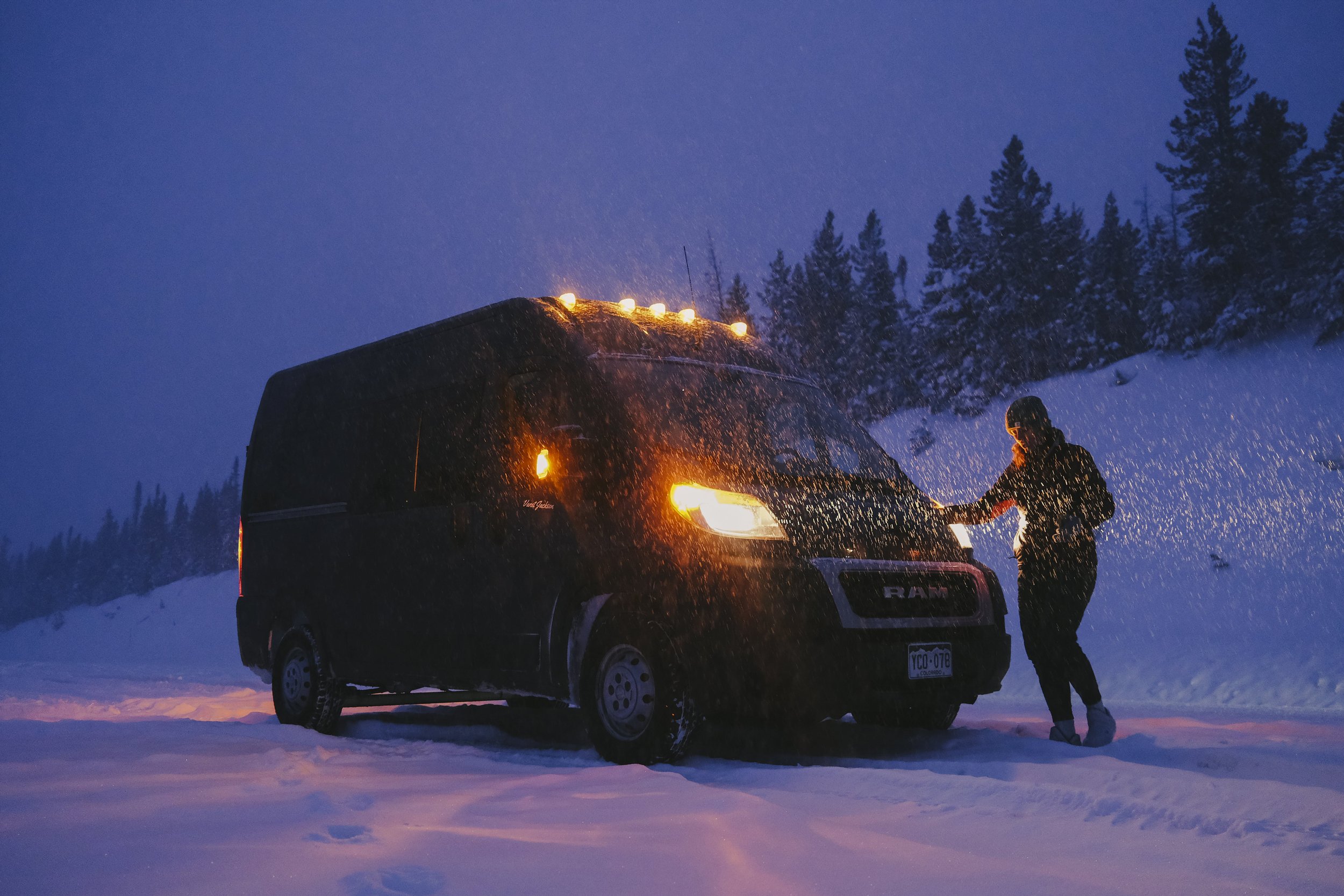 Campervan at night during a snow storm