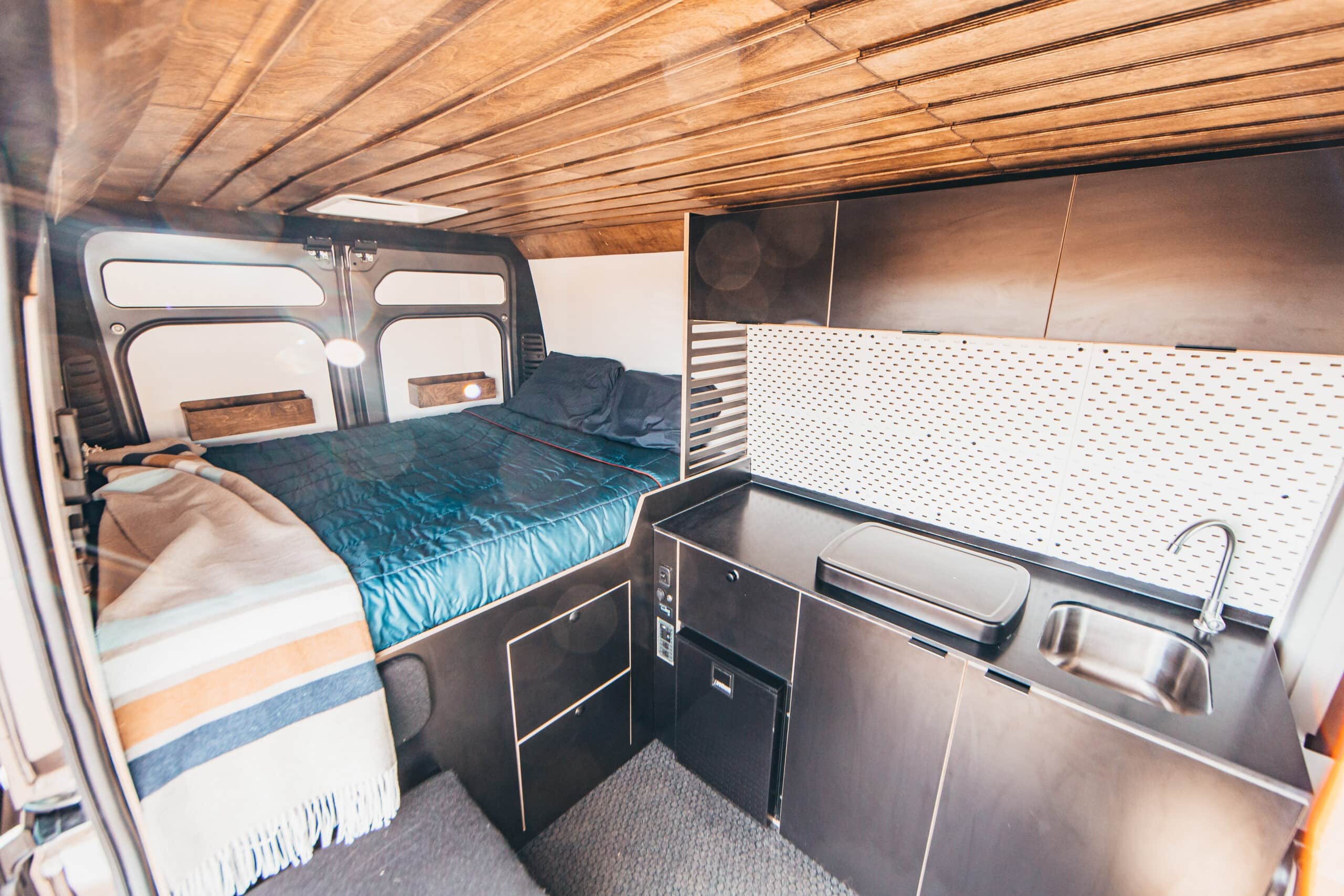 the comfortable sleeping accommodations when you rent a conversion van like the OG Campervan