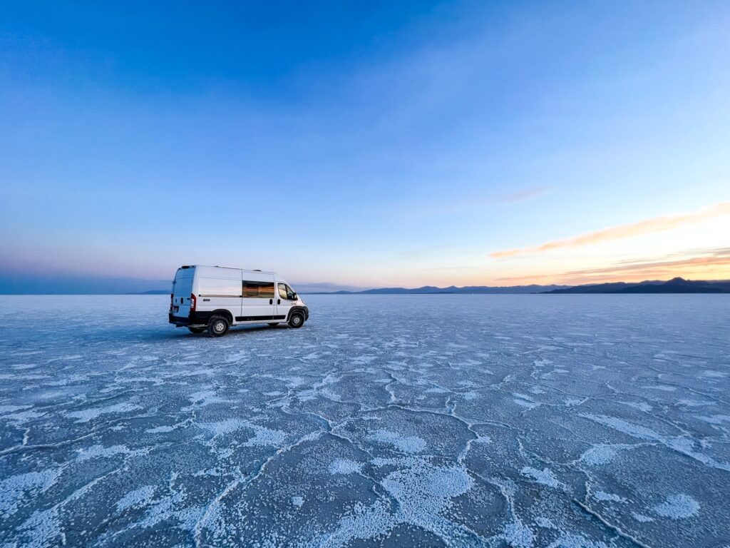 Campervan in the Salt Flats at Sunset
