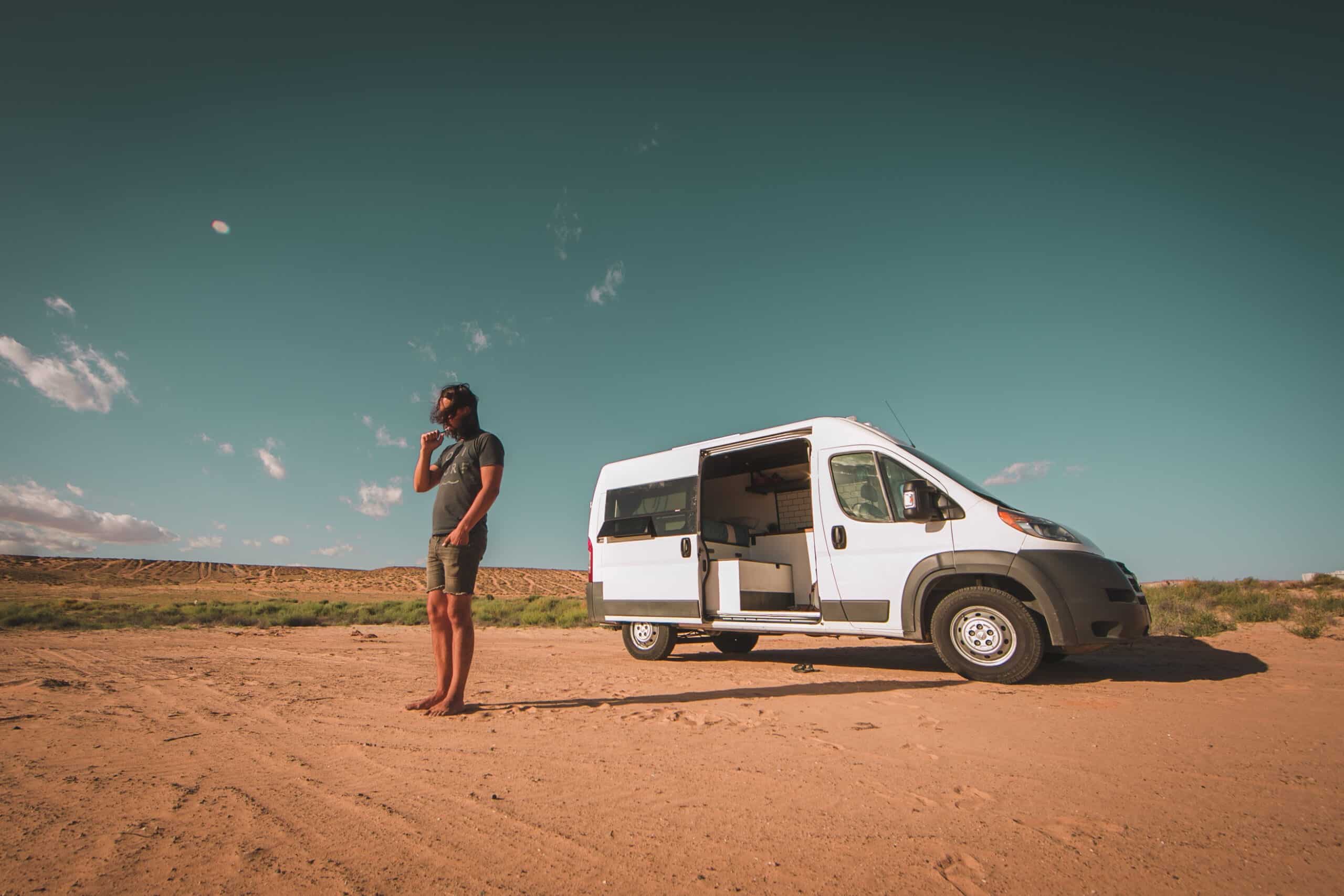 Man Standing in front of a Campervan Rental