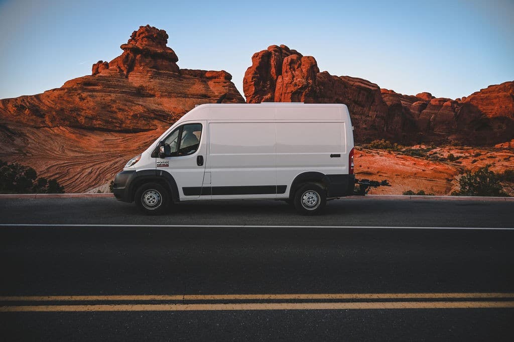 A conversion van for rent on the road in Moab from Native Campervans